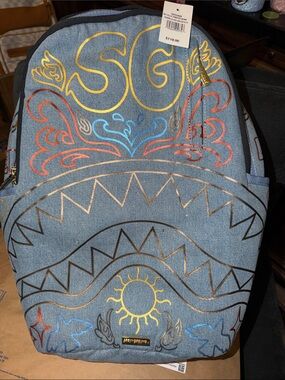 Sprayground Red Tag & Graphic Wallet Detail on Denim Backpack